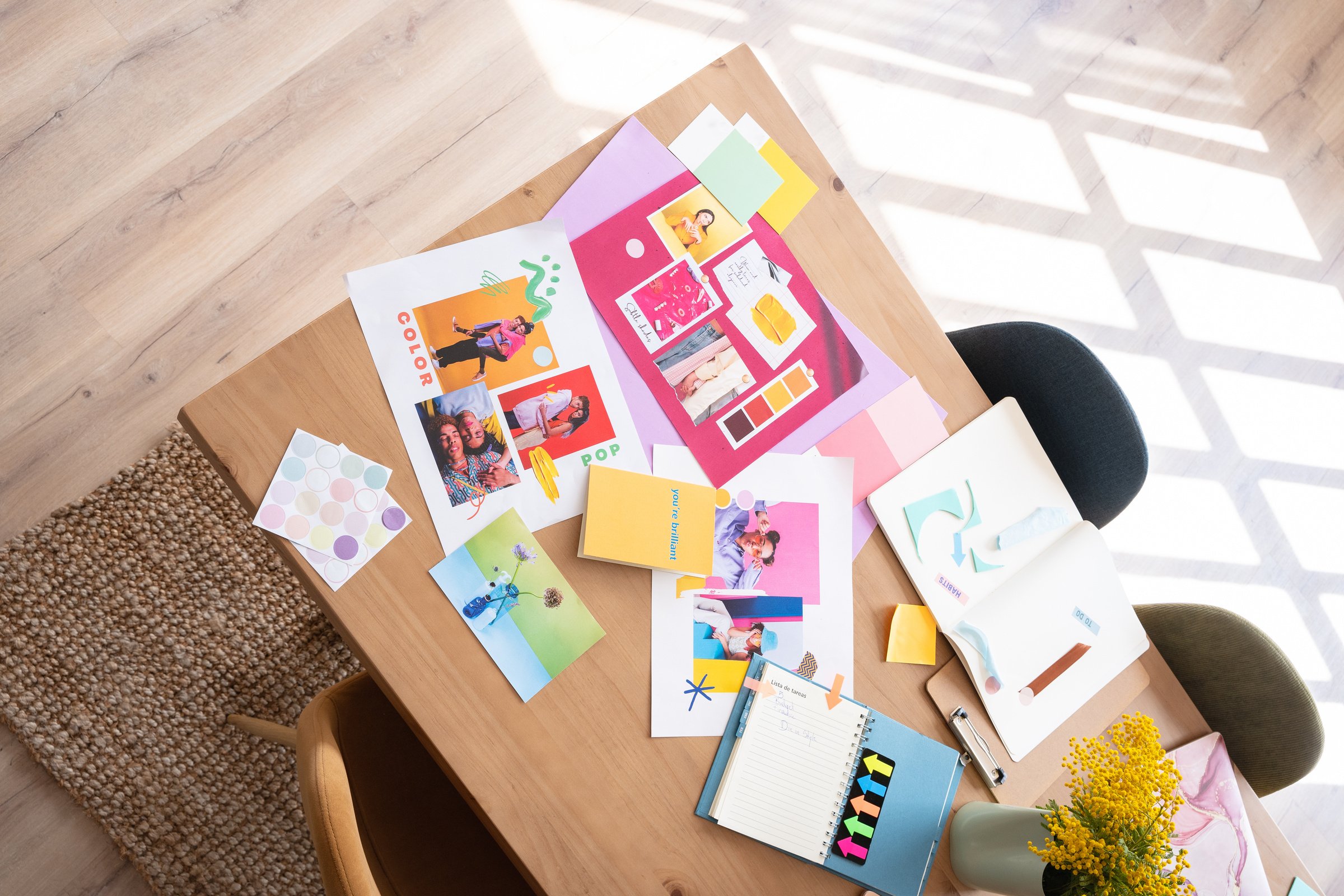 Collaborative Creative Team Branding Materials on Table