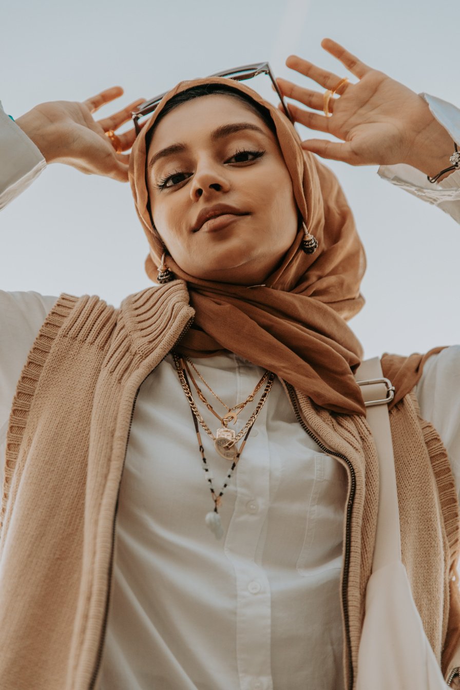 Portrait of Stylish Woman Wearing Hijab Outdoors