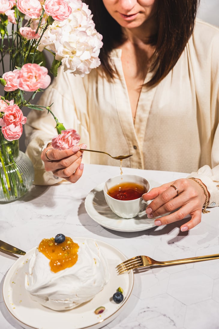 High-Flash Restaurant Dining Woman Having Tea and Dessert